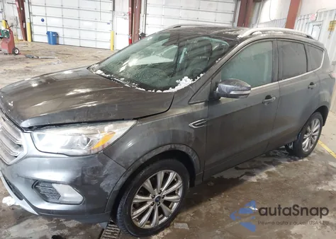 2017 Ford Escape Titanium z USA, uszkodzony, nr VIN 1FMCU0JD4HUB58974